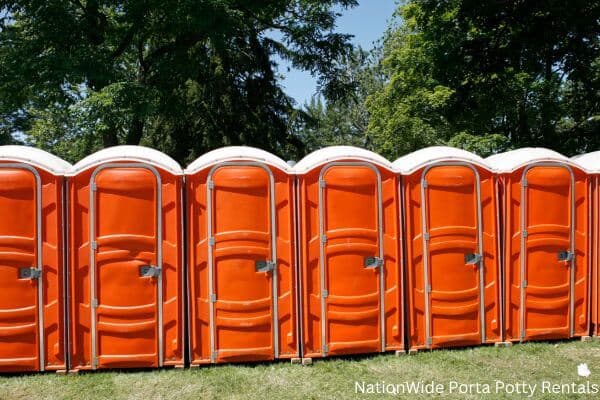 a lineup of clean and well-maintained portable loos for workers in Stony Point, NC