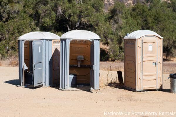 a clean row of portable restrooms for outdoor weddings or festivals in Newton Grove, NC